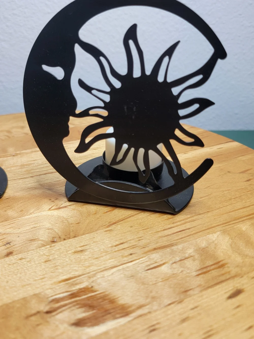 The Southwest Kokopelli Decorative Cast Iron Candle Holders are handmade in the